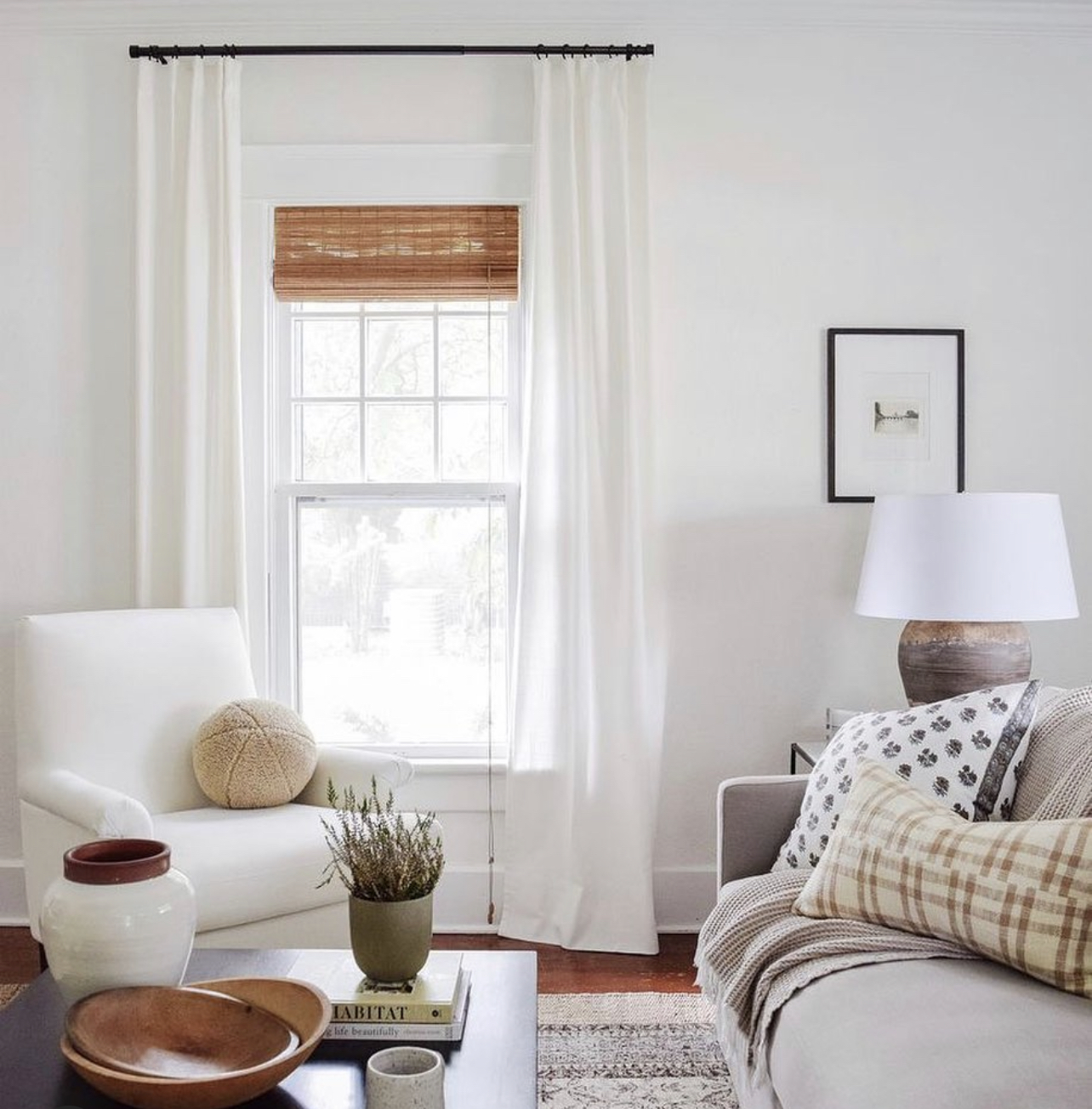 layering drapes over woven shades